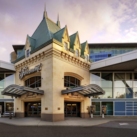 The Fairmont Scottsdale Princess hotel entrance features a distinctive turreted facade with covered drop-offs and modern architectural elements.